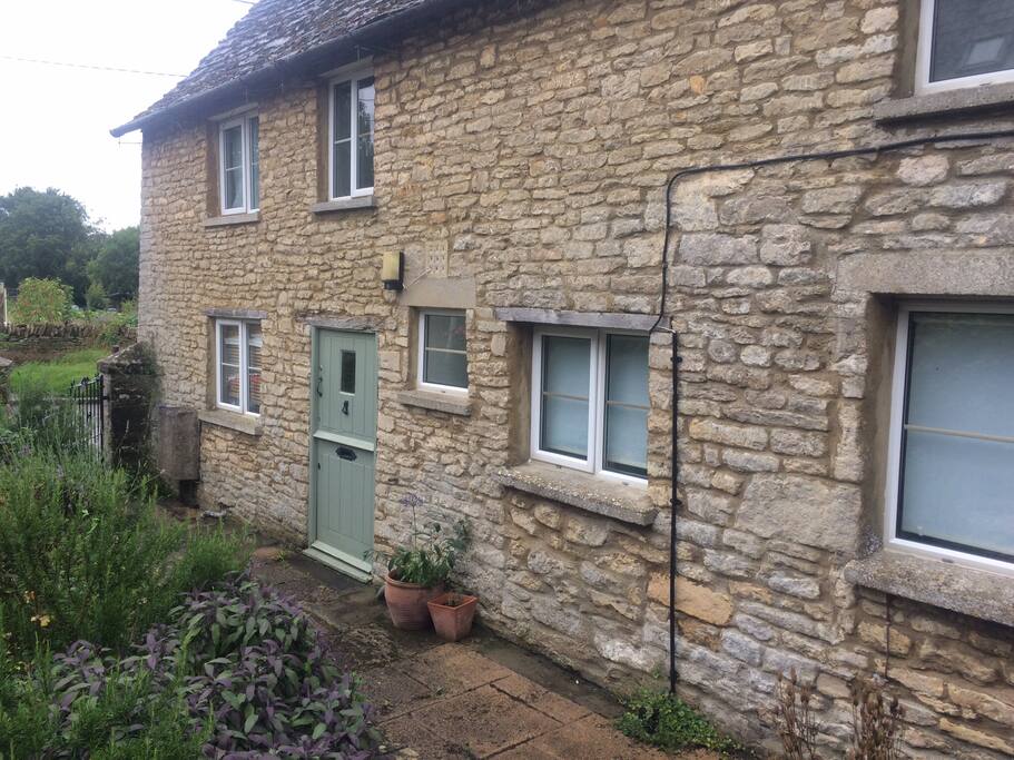 As you step out of Lavender Cottage onto the lane, you look across to the allotments.