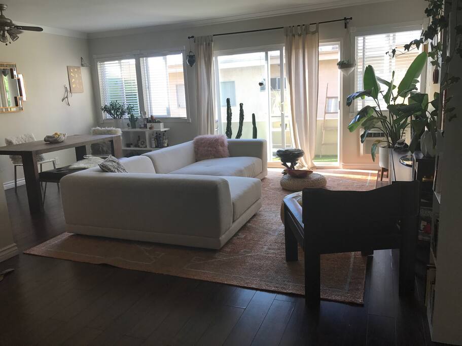 Living + Dining Rooms and View of Balcony
