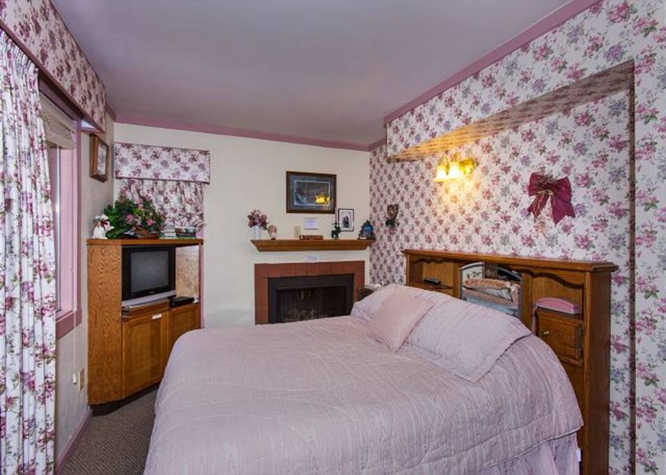 Master bedroom with fireplace.