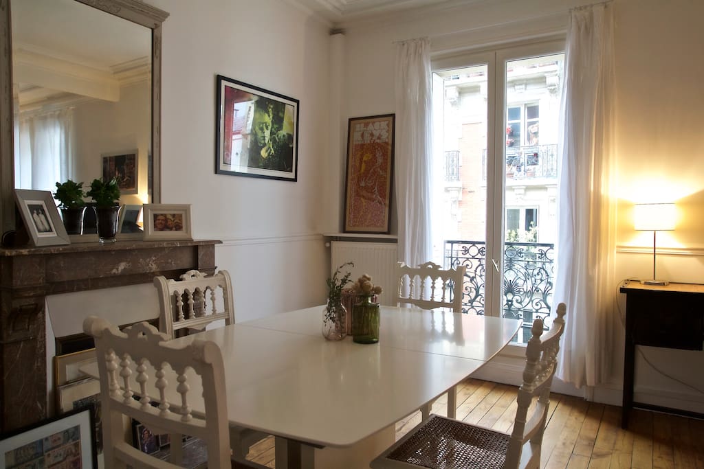 Dining room with fireplace and french doors
