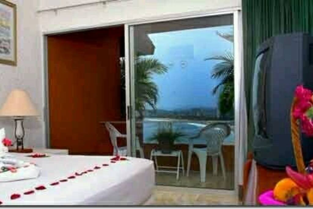queen size bed and TV.