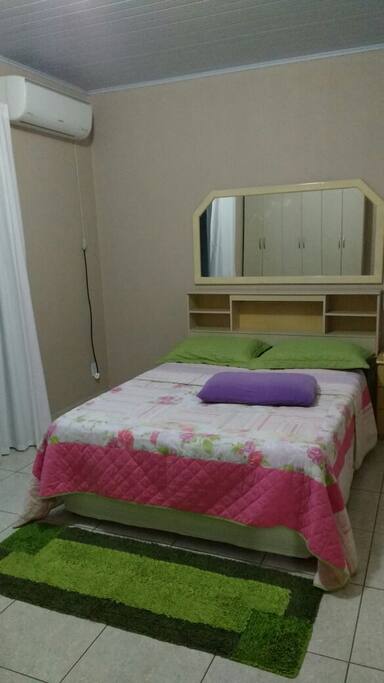 Quarto com ar condicionado