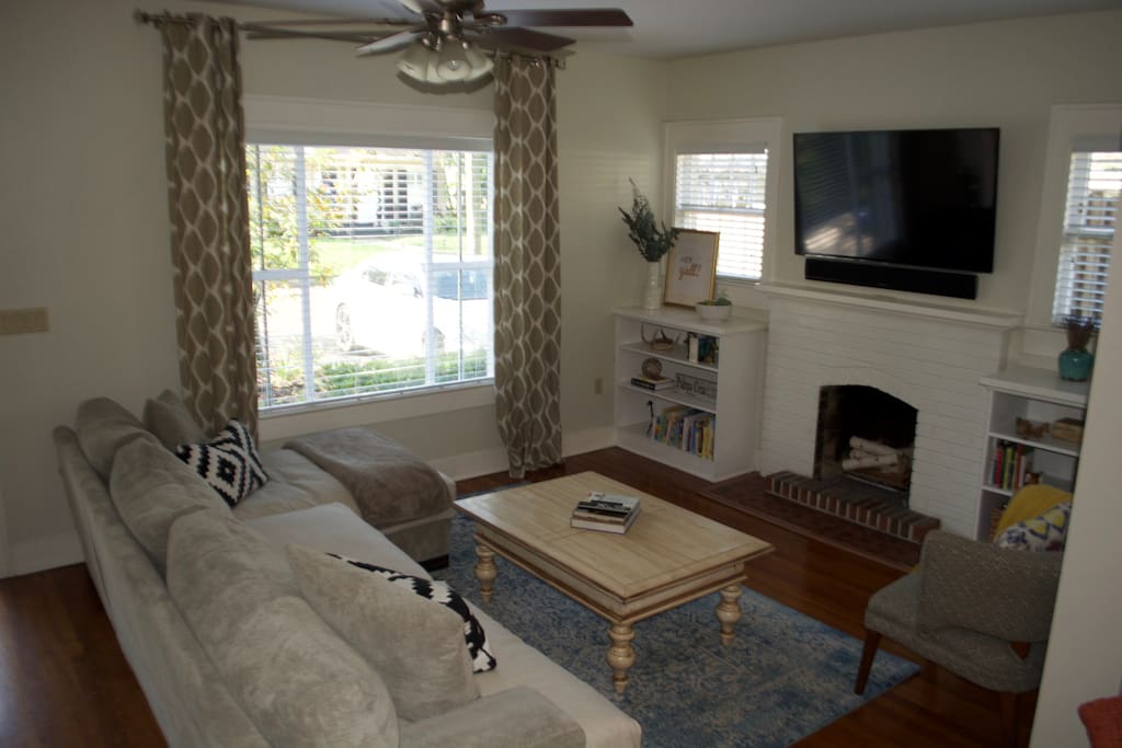 Cozy living area with cable, working fireplace and a super comfy oversized sofa.