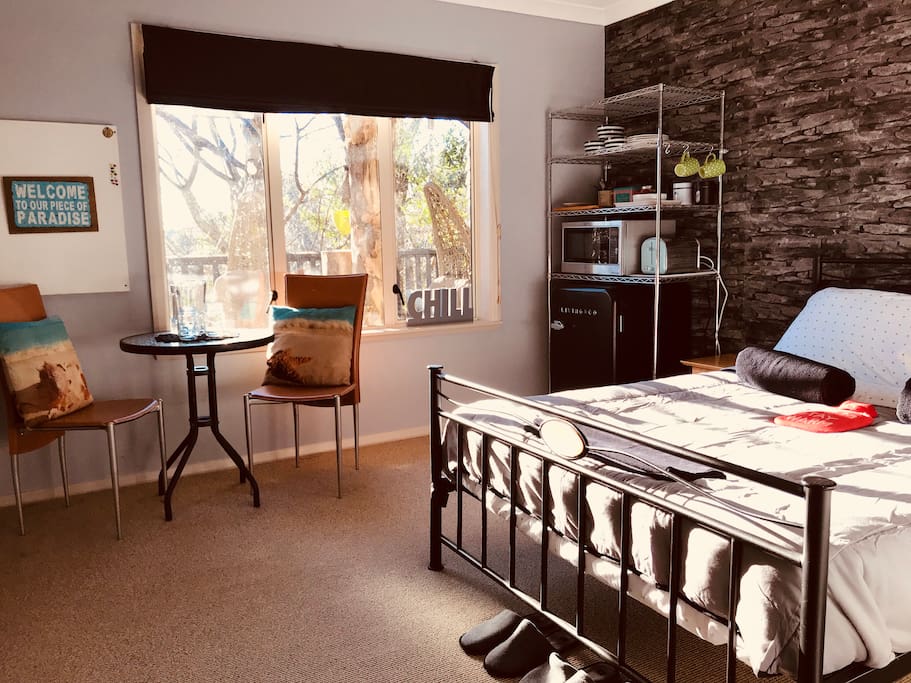 Cozy Bedroom with Kitchenette