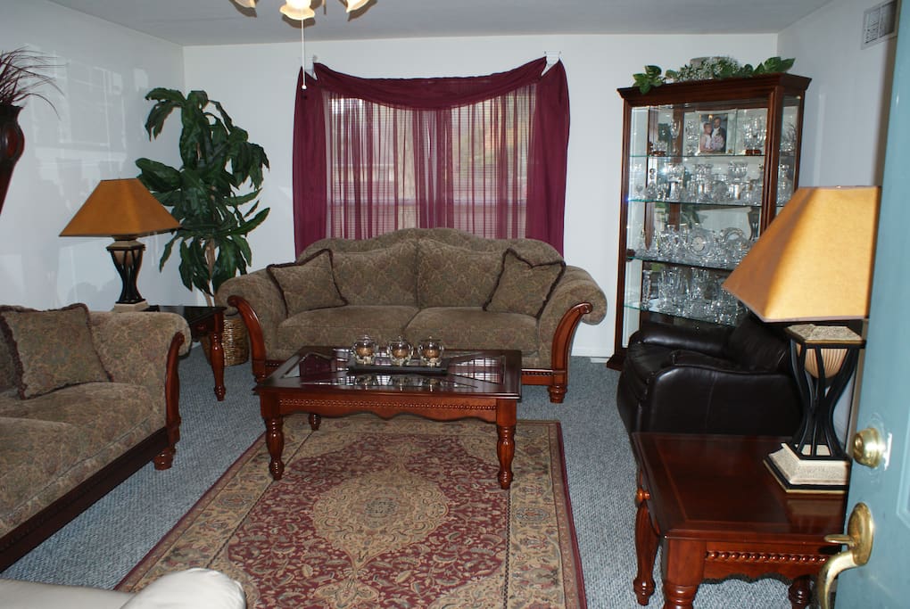 Spacious Living room with full Couch, Love seat with Air Mattress available. Sleeps 2