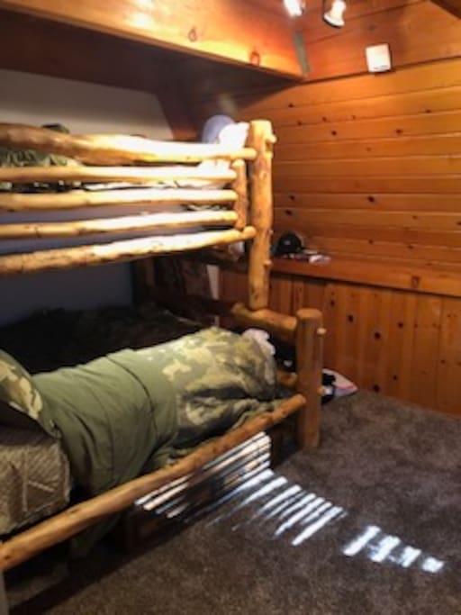 main floor bedroom bunk beds with twin over a full. can sleep 3 in this room 2 on full 1 on twin
