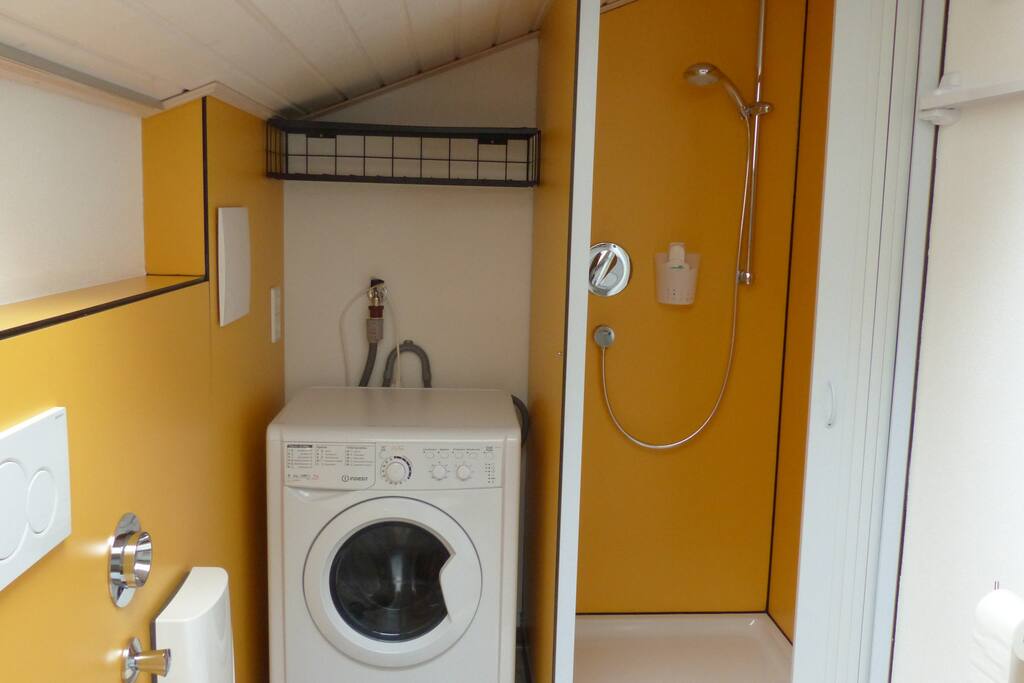 Washing- /dryer combination next to the shower