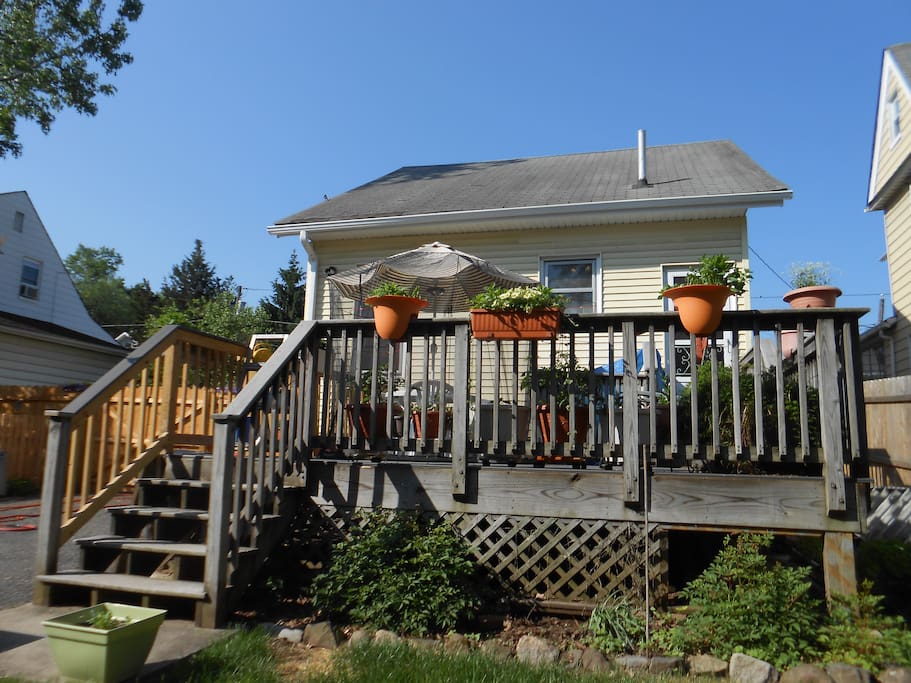 My rear deck with summer flowers.
