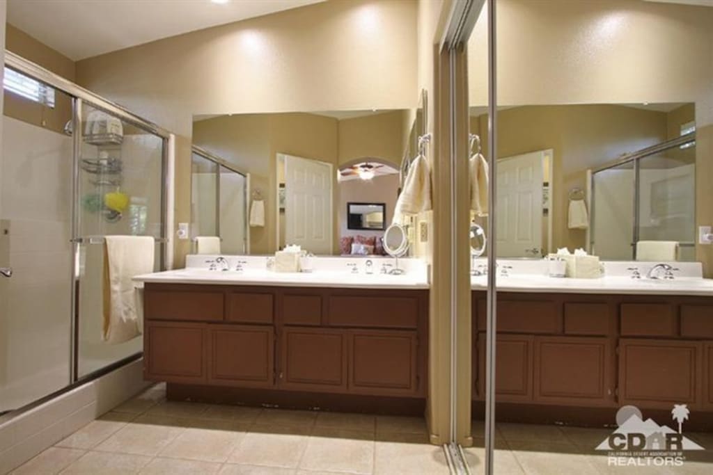Master bath with private toilet room.