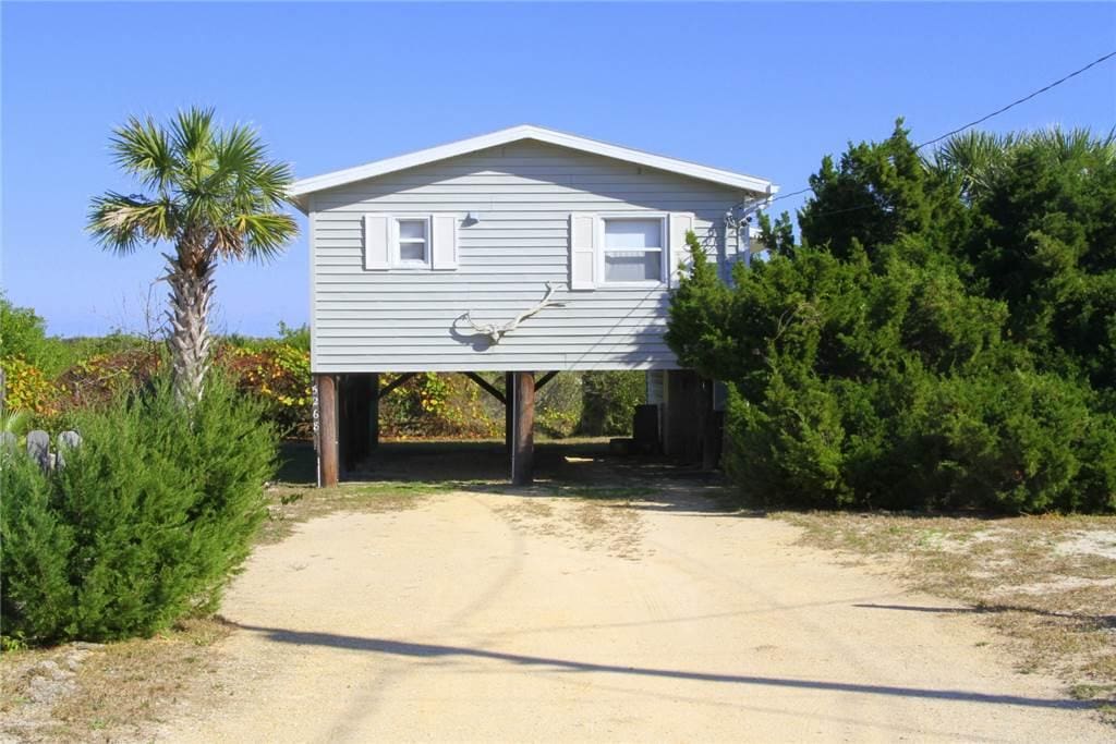Convenient Parking - Pull your care into the carport beneath the stilted Pounds Cottage and keep it out of the elements. There’s