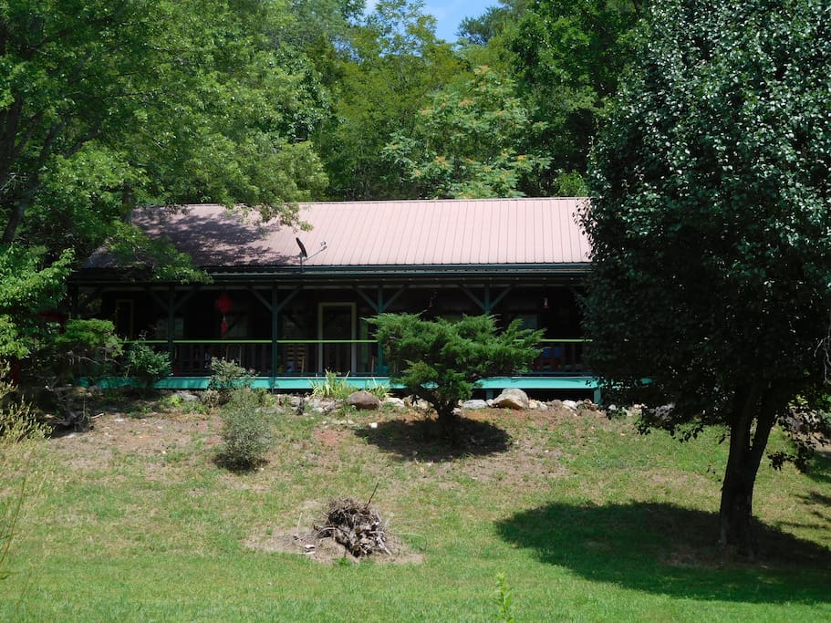 The house sits on the edge of the old growth forest and the rolling fields of English Valley.