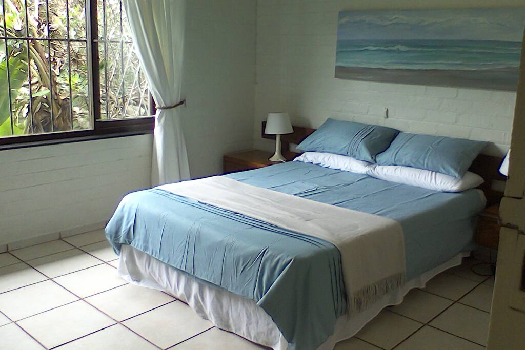 Main bedroom with double bed. Great lighting with stunning views of the garden.