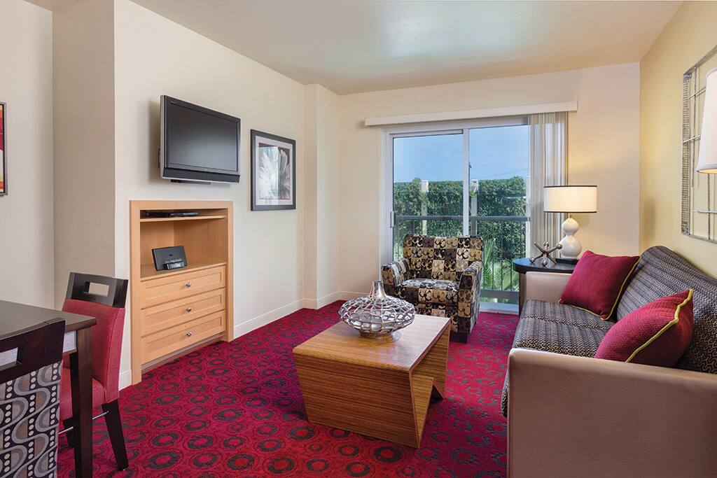 Living Room With Balcony & Double Sofa Bed