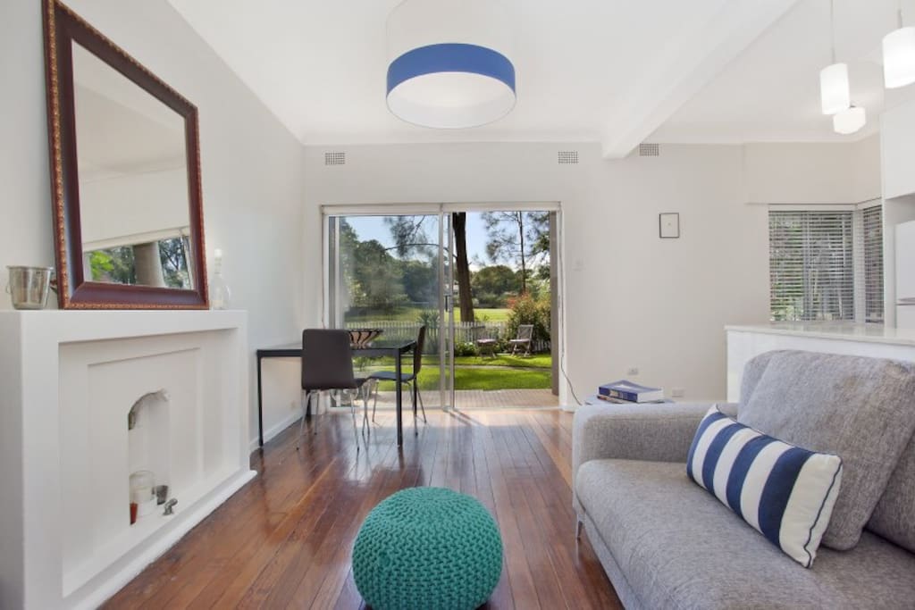 Direct access to sunny green garden, which opens directly onto vast green spaces and adjacent golf courses.
