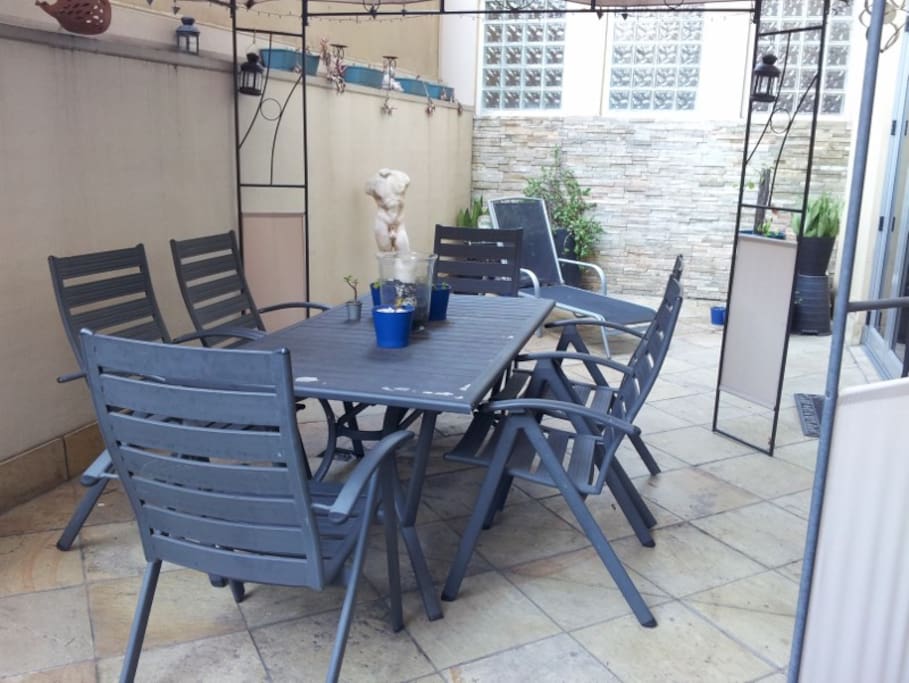 Large shared courtyard with barbecue