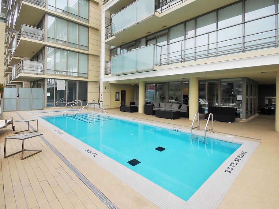 Outdoor pool open year round...adjacent to the fully equipped gym.