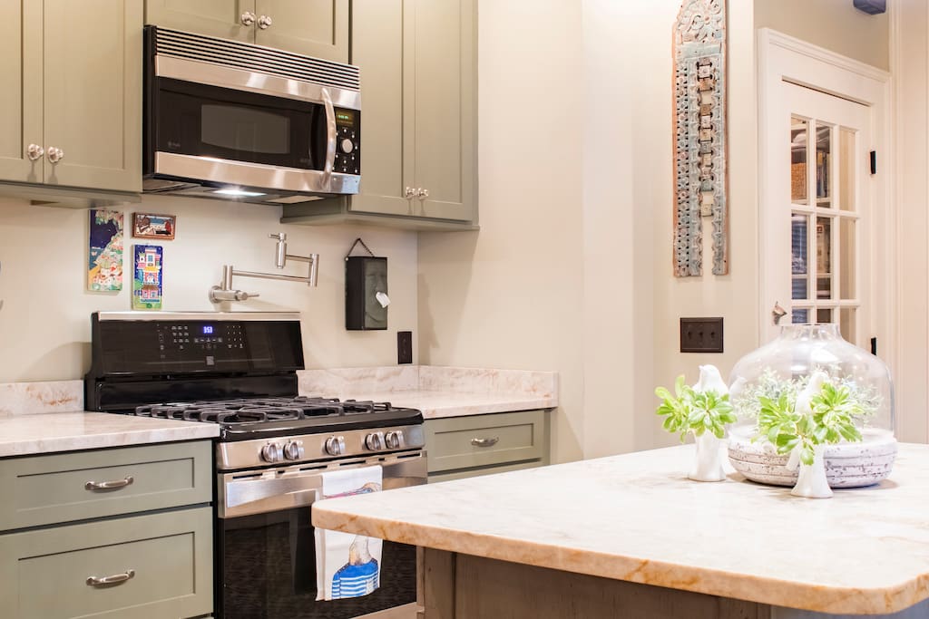Kitchen with stove and microwave