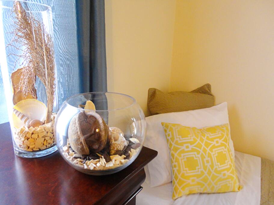 Second bedroom with two single beds & attached private washroom.