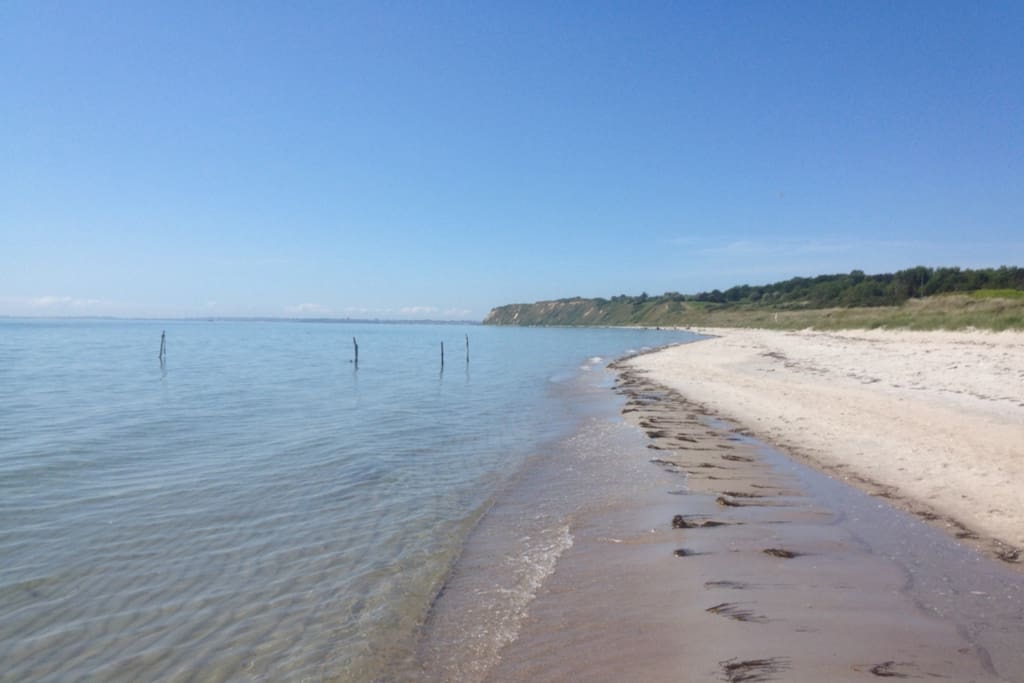 The nearby beach with perfect white sand and clear water.