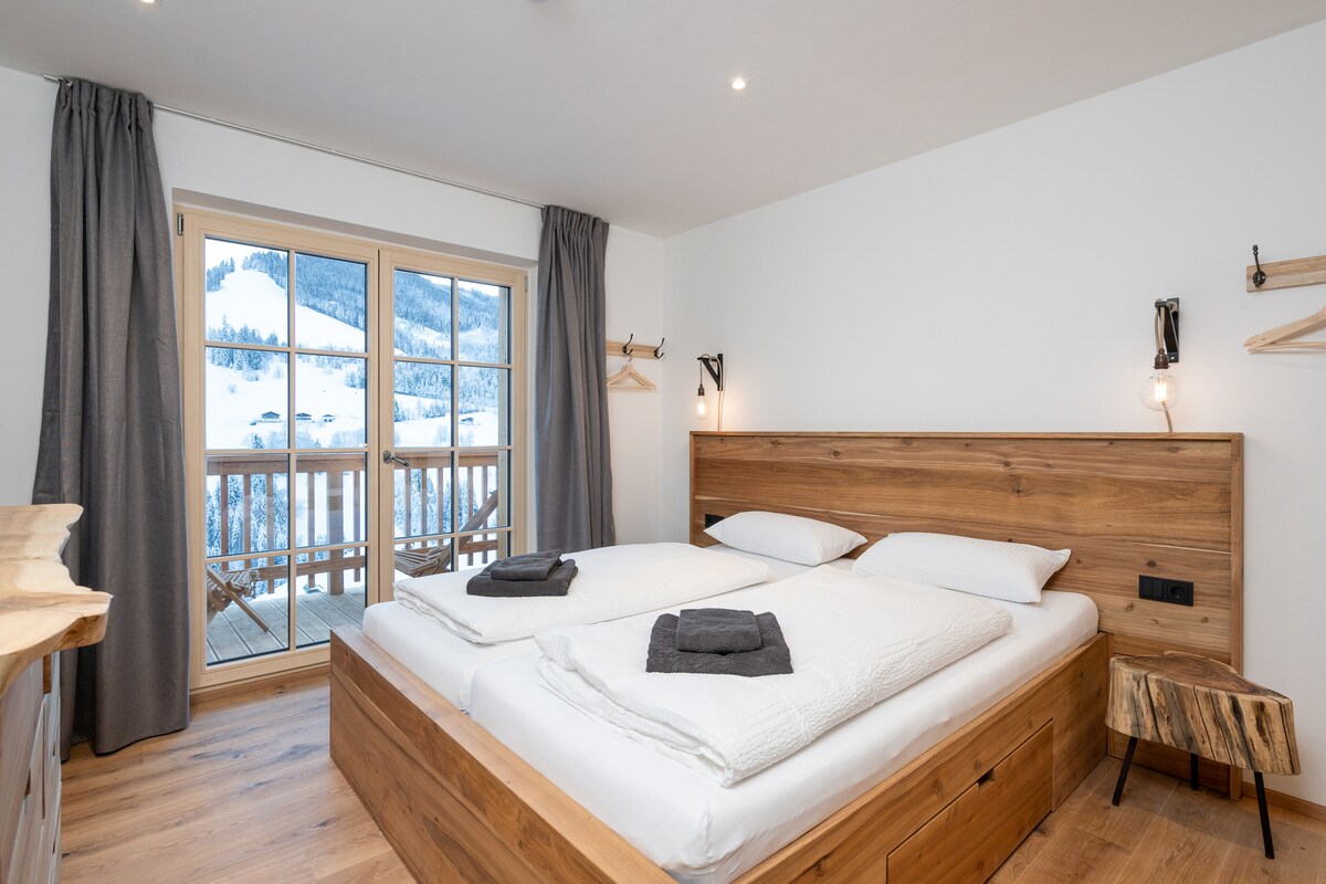 ห้องนอนสำหรับครอบครัวพร้อมเตียงคู่และเตียงสองชั้น