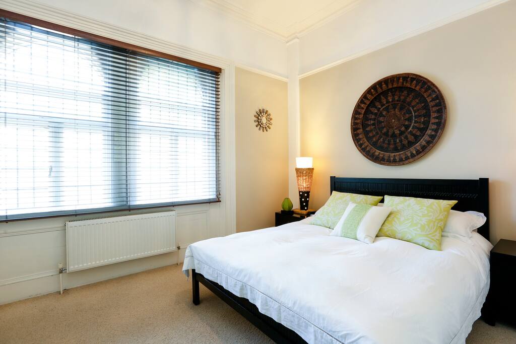 Spacious double bedroom with contemporary decor