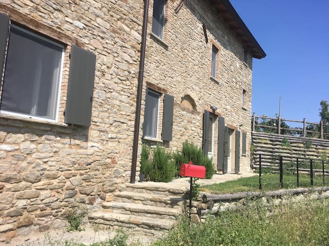 stone apartment with views of the Apennines