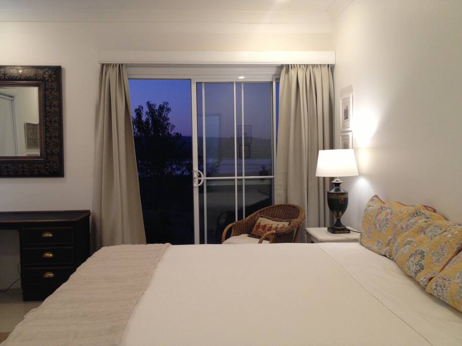 This room catches the change of light over Lake Wallace.