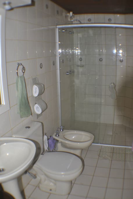 Neat bathroom with central hot water system.