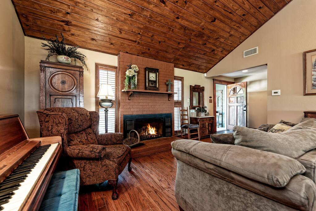 Snuggle up in front of this lively fireplace on a cold evening.