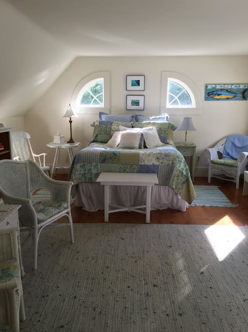 This is a very large room with several sitting areas in it!