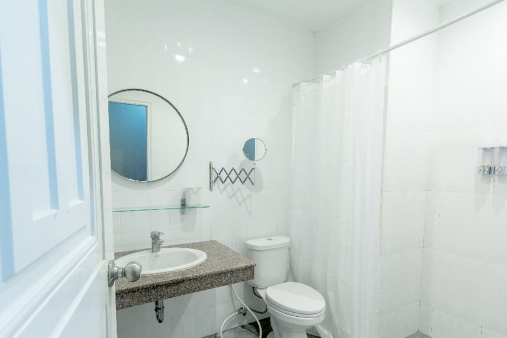 Private bathroom with rain shower