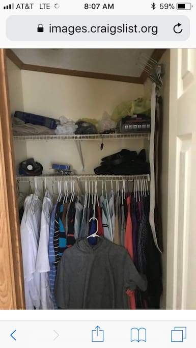 Walk-in closet , with shelving.
