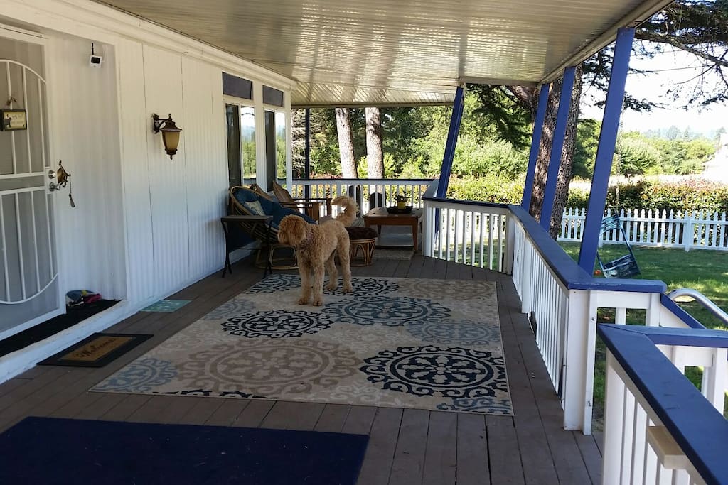 Wrap around porch to relax on.