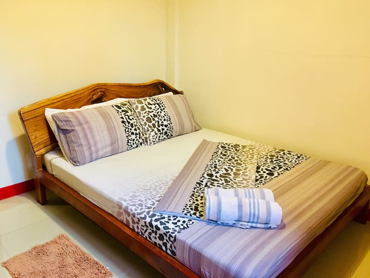 Bedroom with Queen Bed, AC & Clothes Rack