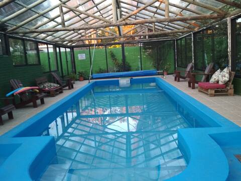 Heated pool half a block from the beach.