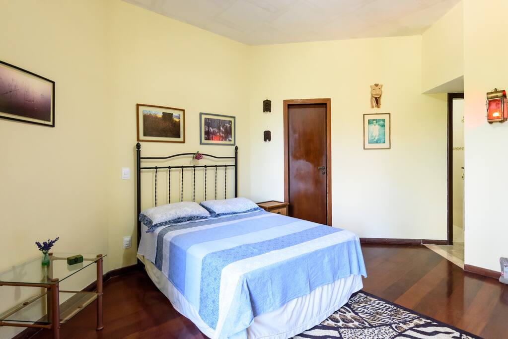 Double bed with clean towels and linens.