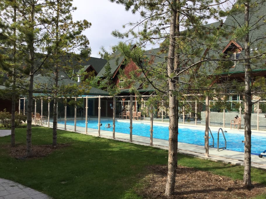 Inviting courtyard with Canmore's largest heated year round pool