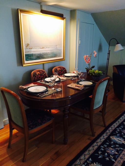 Dining table w/ 6 chairs. Doubles as a work desk.