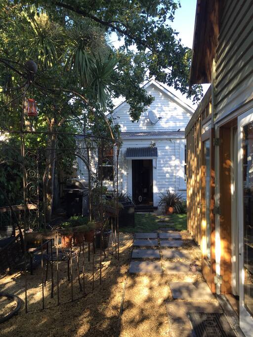 Looking back to the house from the rear garden. The studio is on the left.