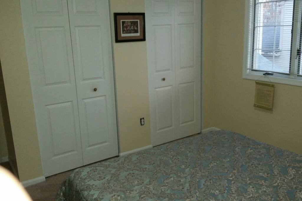 Spacious double closet for his and her convenience.