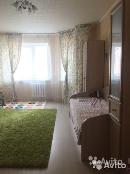 Children's room with sliding out 2 single beds, plenty of toys, working table