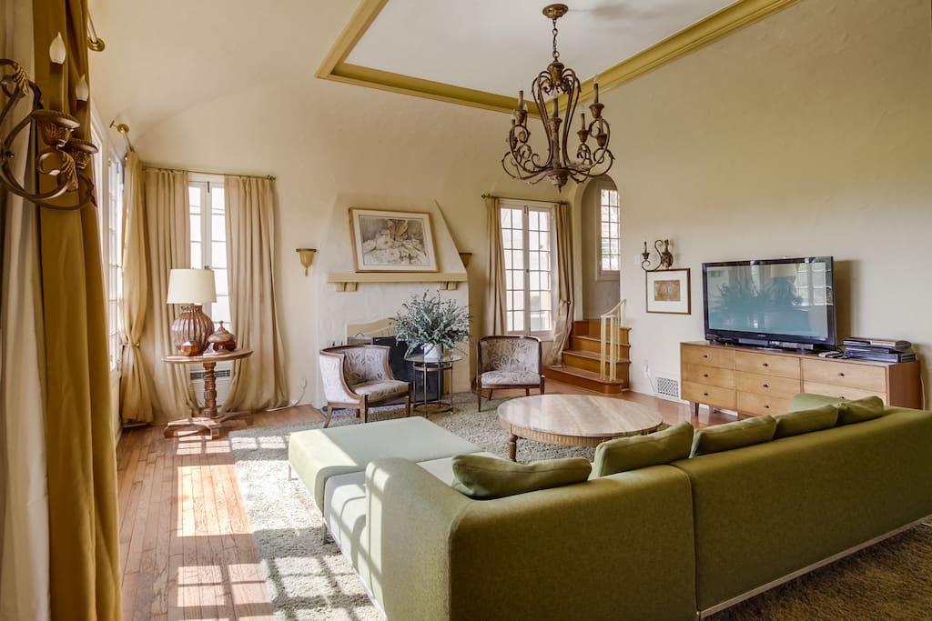 Living Room, stairs to dining room at right