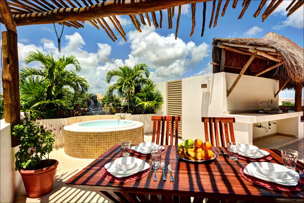 Kick Back and Soak Up the Sun on the Private Roof Top Patio