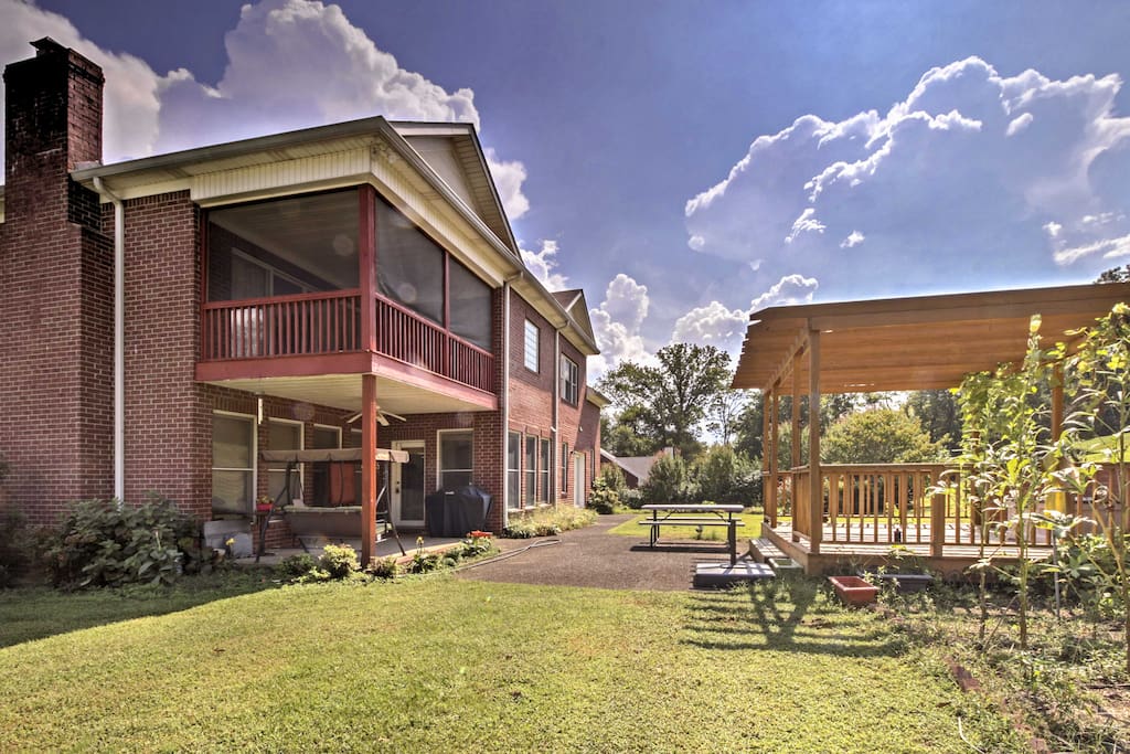 A lovely garden and back pergola lead you to the unit's back patio entrance.