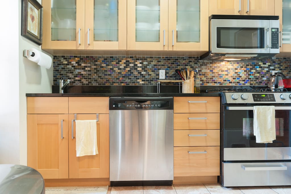 Updated kitchen! Dishwasher, microwave, newer appliances.