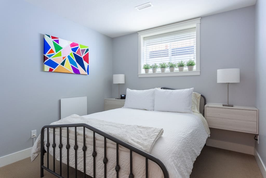 Bedroom #1 has a comfortable queen sized bed made with super soft bedding to ensure a great nights sleep. We also have black out curtains installed for those sleepers that require extreme darkness.
