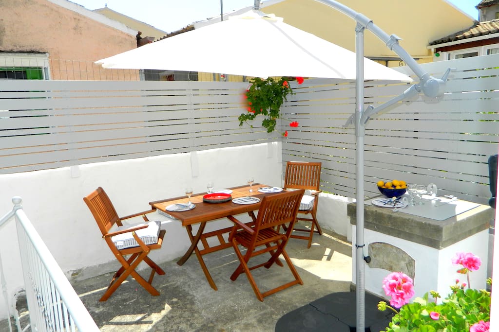 Raised sun drenched terrace for outdoor dining