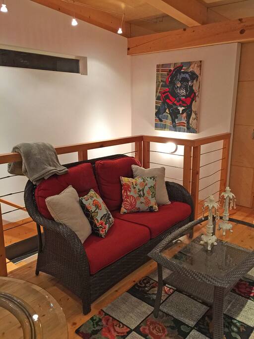 Comfortable sitting area with beautiful gallery lighting