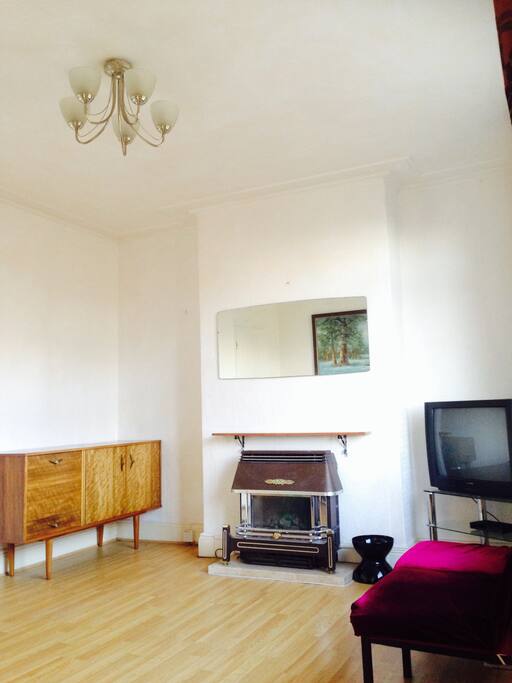 A spacious, airy lounge with a fireplace for those cold winter nights