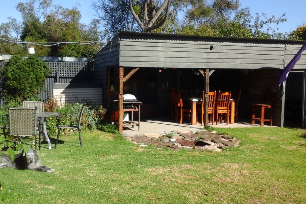 All weather outdoor area with BBQ and fire pit.